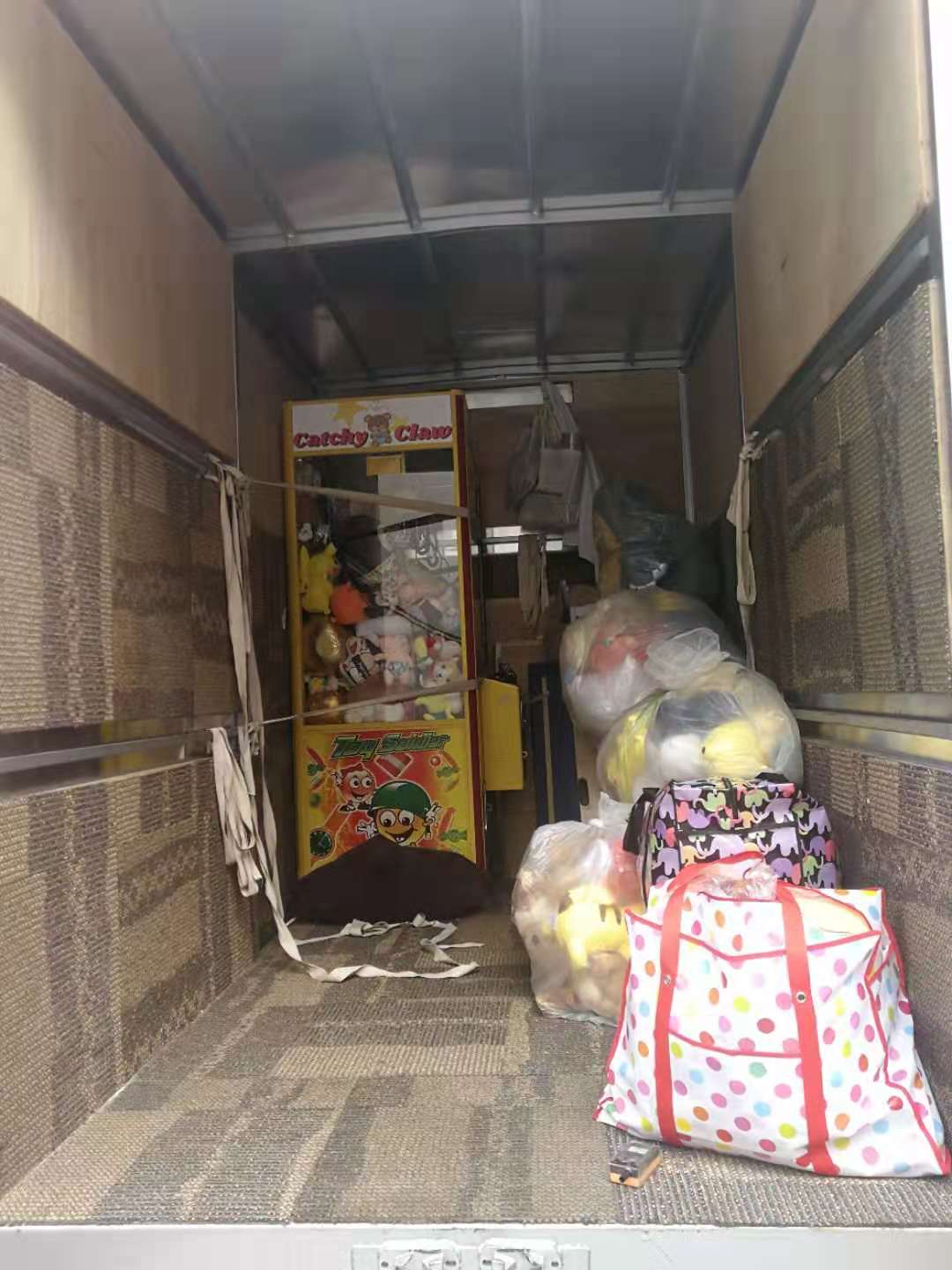 Mixed leftovers and loose items inside a disposal truck in Singapore