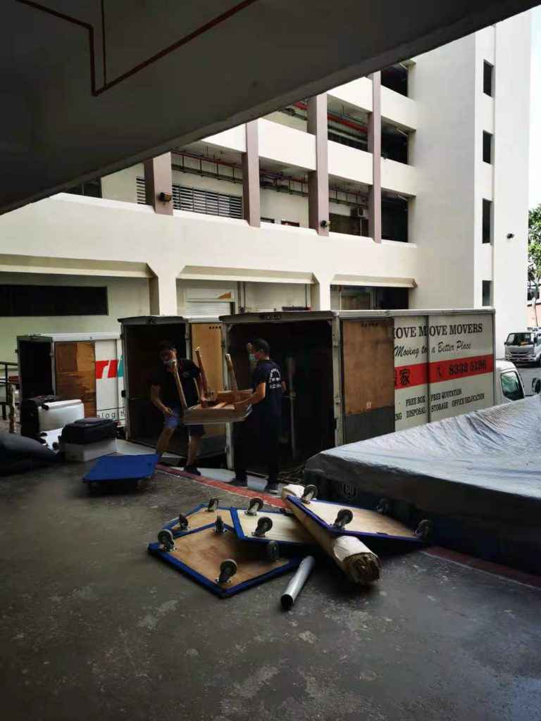 Science park office relocation tailgate loading - move move movers – move move movers – move move movers Move Move Movers crew loading office furniture into a branded truck during an office relocation at Science Park