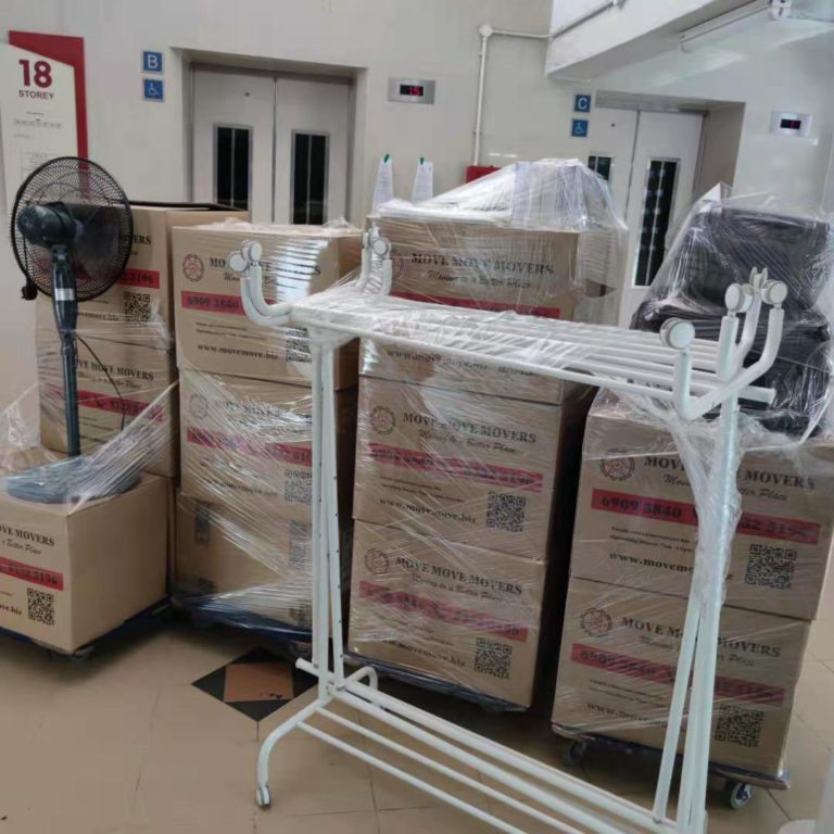 Wrapped commercial equipment and garment racks prepared for an office move Wrapped commercial equipment and garment racks prepared for an office move
