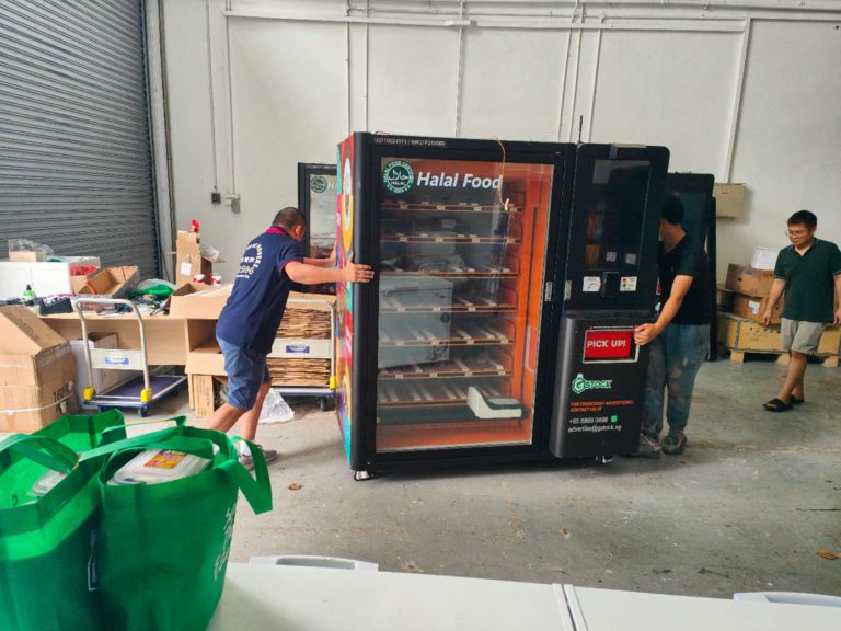 Move Move Movers team handling bulky commercial equipment in Singapore