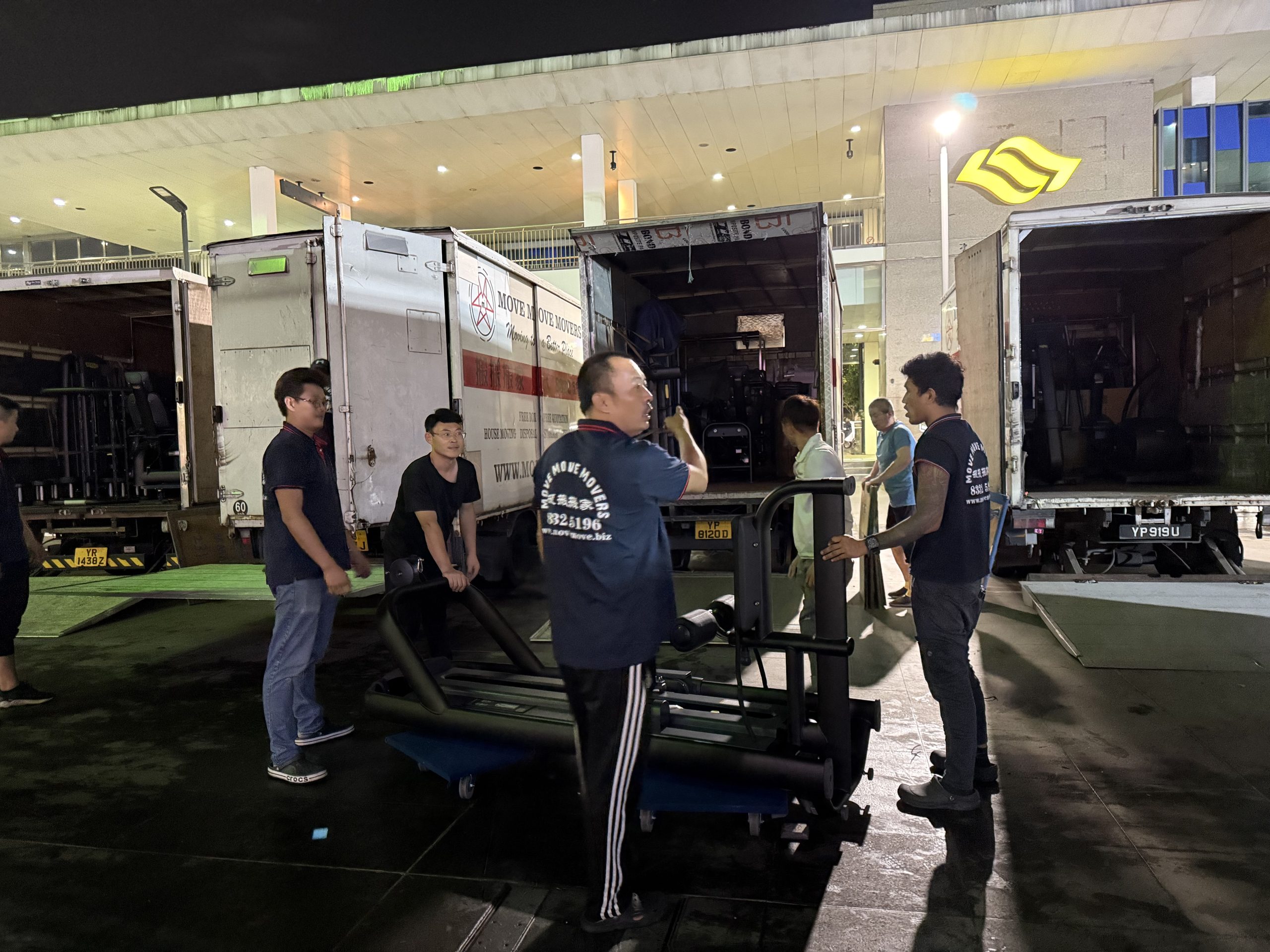 Crew and truck staged at a loading area for a mixed-load clearance in Singapore
