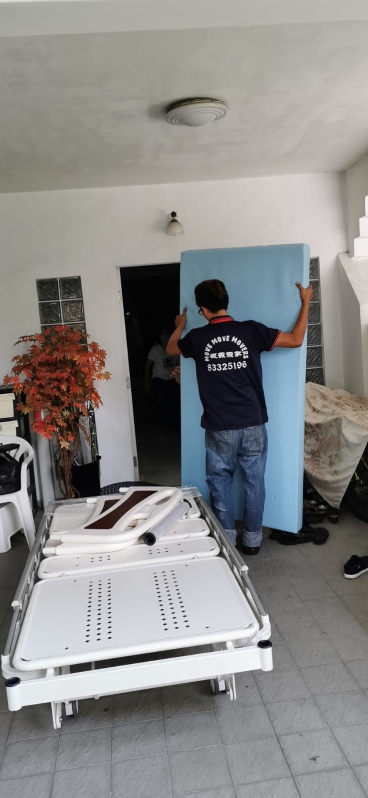 Mattress and bed-frame parts prepared for removal in Singapore