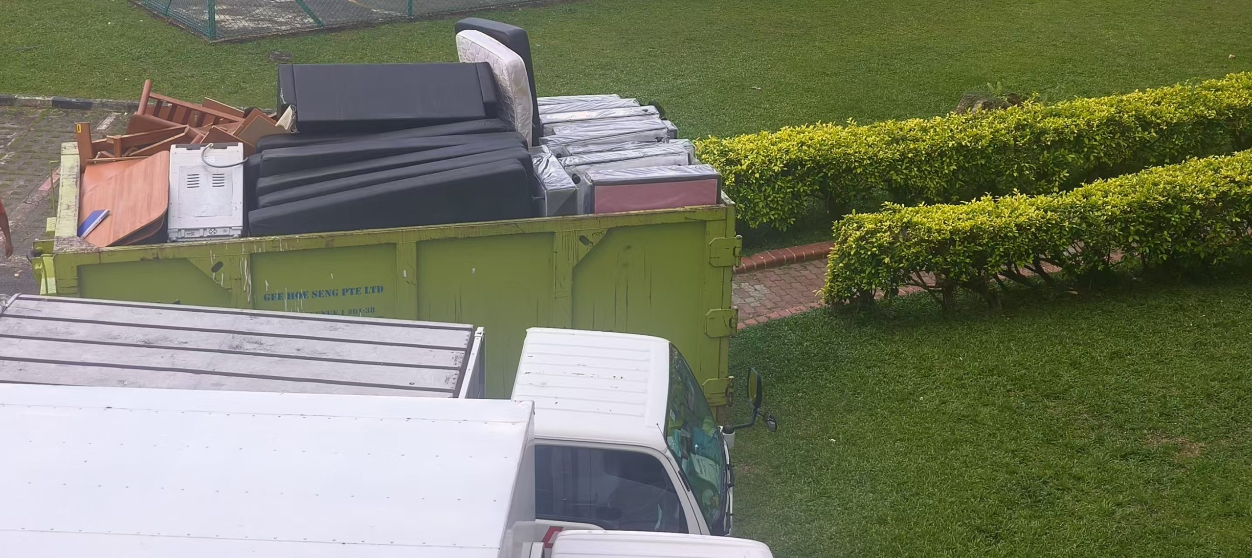 Mixed mattresses and bulky leftovers staged for disposal in Singapore
