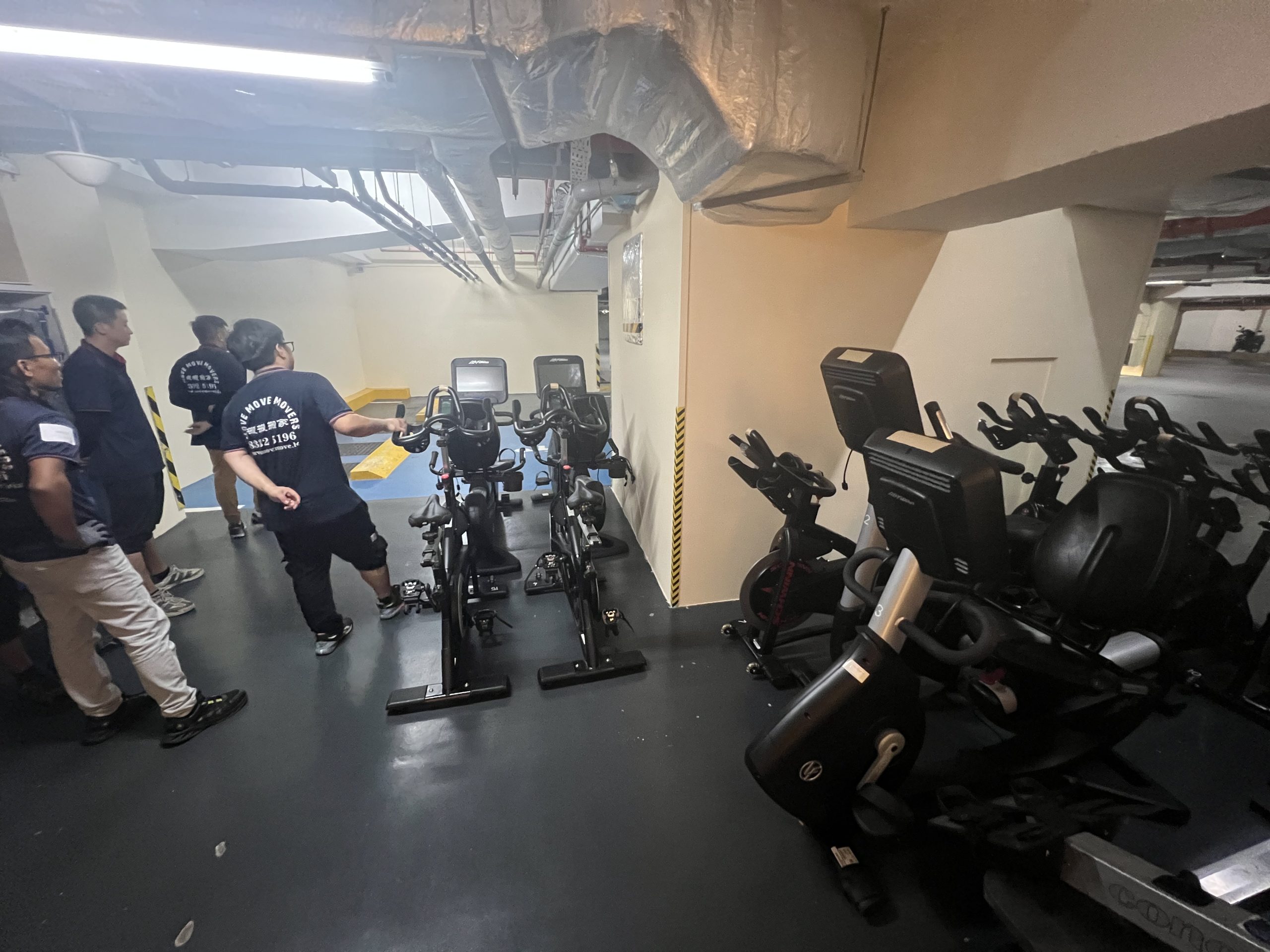 Commercial equipment room being cleared as part of an office move-out in Singapore
