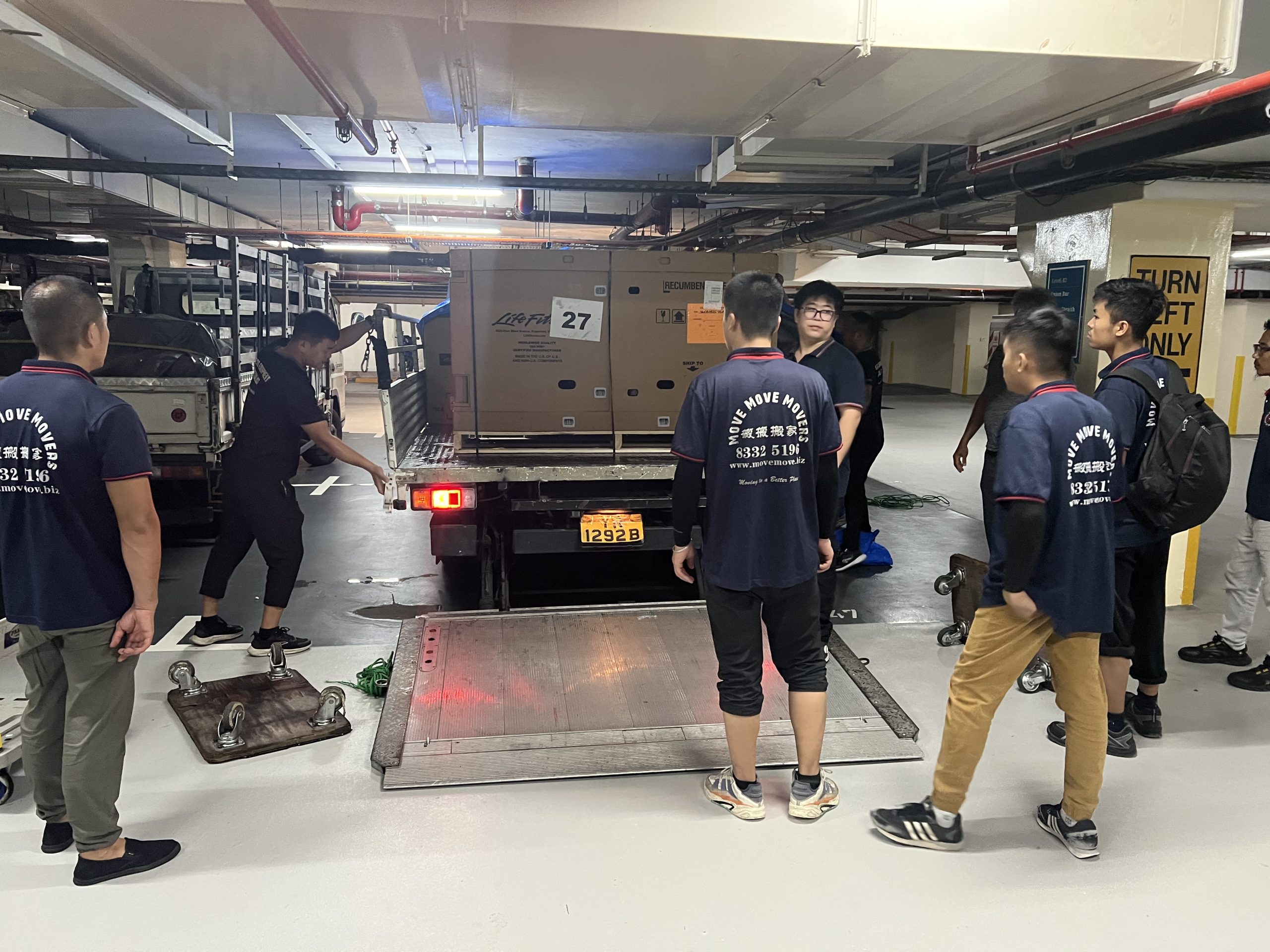 Move Move Movers crew preparing a commercial loading sequence for office clearance in Singapore