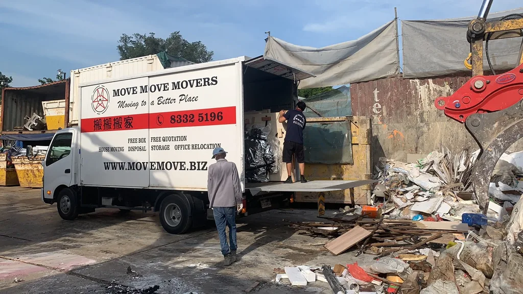Move Move Movers lorry unloading at a waste handling site in Singapore
