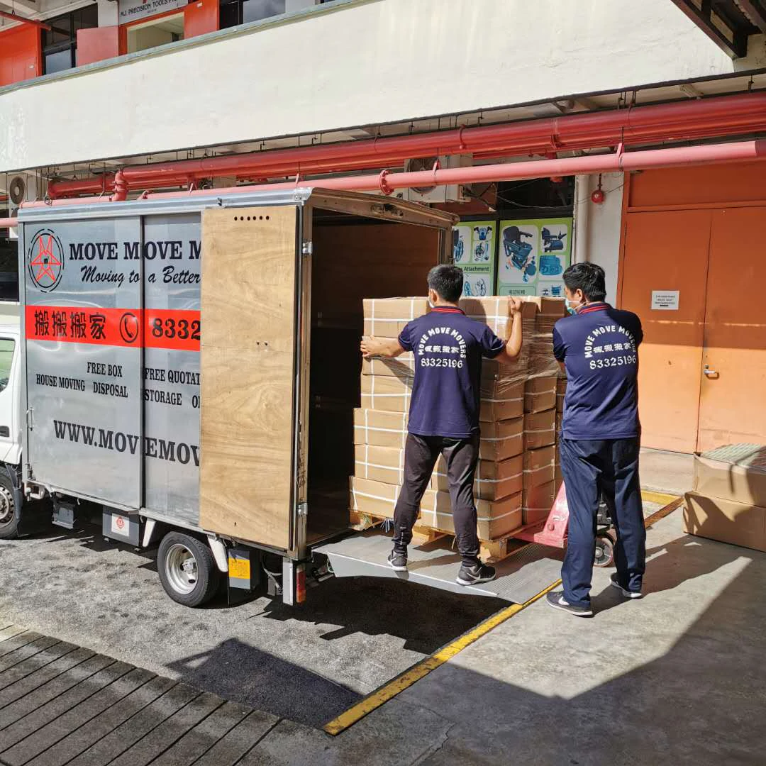 Move Move crew loading a wrapped cabinet into a lorry Move Move crew loading a wrapped cabinet into a lorry